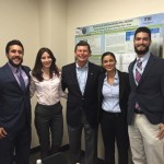 FIU STEM Students and DOE Fellows (Aref, Kiara, Christine, and Christian) with Indian River State College President, Dr. Edwin Massey