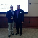 FIU STEM Student, Lazaro Mesa (3rd place oral presentation winner) and Dr. Lagos