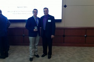 FIU STEM Student, Lazaro Mesa (3rd place oral presentation winner) and Dr. Lagos
