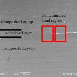 SEM image of contamination at bondline.